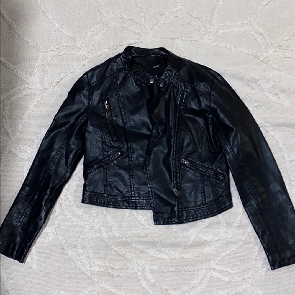 Black leather jacket with front zippers.